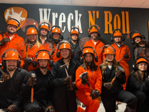 Group photo at Wreck N Roll smash room branding Des Moines